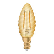 Ledvance - FL-CP-LCNDT2.5SESGXWW LDV - Ledvance Osram LED Candles Part Number 4099854091490 <p>LED Vintage Filament Twisted Candle 2.5W (22W eqv.) E14 2400K Gold</p>